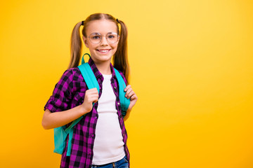 Closeup photo of little lady return classroom wear specs new bag checkered shirt jeans denim isolated yellow background