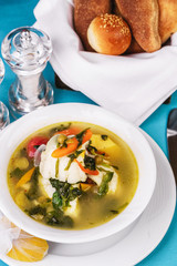 Mediterranean squid, chicken, crab meat and vegetable soup