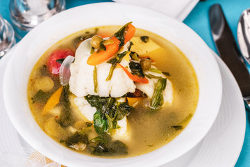 Mediterranean squid, chicken, crab meat and vegetable soup