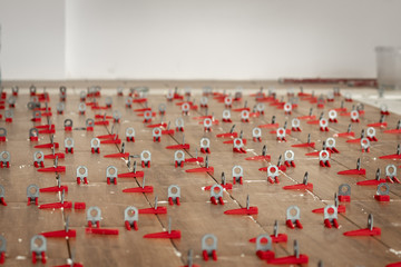 Obraz premium View of the floor on which ceramic tiles terracotta are located. Modern work technology. House Interior.