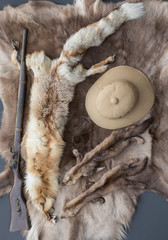 hunter's cap and animal skin
