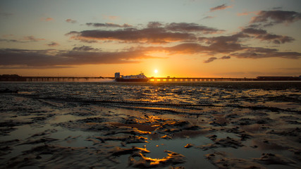 Gliding across the sands at sunset