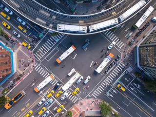 Aerial view of cars and trains with intersection or junction with traffic, Taipei Downtown, Taiwan....