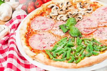 Composition with delicious pizza and ingredients close up