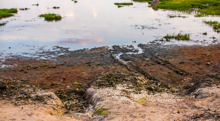 Sandy beach and sunset at the bay