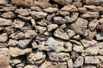 Fototapeta premium Naturstein Mauer im Mittelmeer