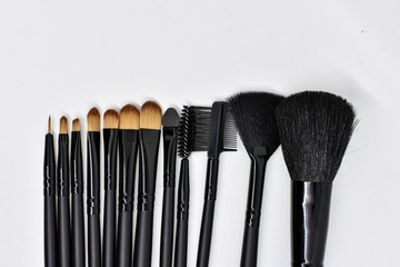 various makeup brush sizes isolated on white background