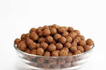 chocolate corn balls for breakfast in glass plate