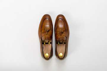 Classic male leather shoes. Isolated on white background. Top view