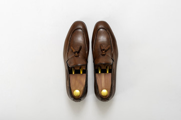 Classic male leather shoes. Isolated on white background. Top view