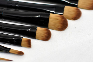 various makeup brush sizes isolated on white background