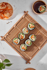 Korean roll Gimbap(kimbob) made from steamed white rice (bap) and various other ingredients
