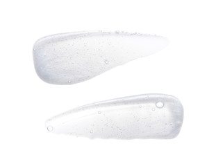 Pearly white smears and texture of face cream or acrylic paint isolated on white background