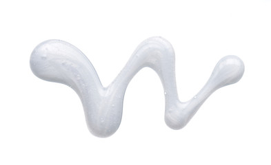 Pearly white smears and texture of face cream or acrylic paint isolated on white background