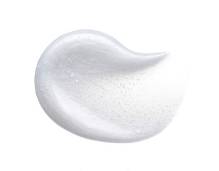 Pearly white smears and texture of face cream or acrylic paint isolated on white background - obrazy, fototapety, plakaty