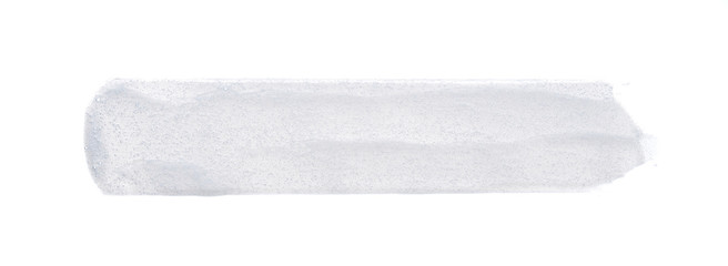 Pearly white smears and texture of face cream or acrylic paint isolated on white background