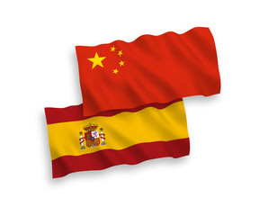 Flags of Spain and China on a white background