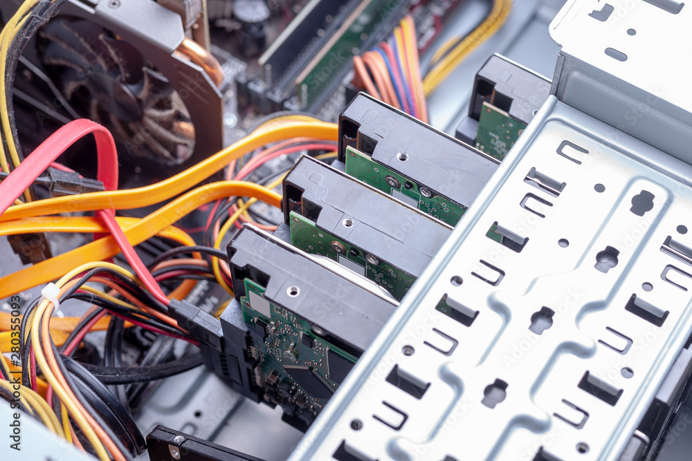 Aufkleber close up open desktop pc for hardware maintenance. hdd raid massive for data storage. dust cleaning 