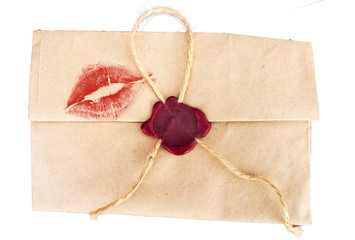 Retro envelope on a white background with a trace of a kiss.
