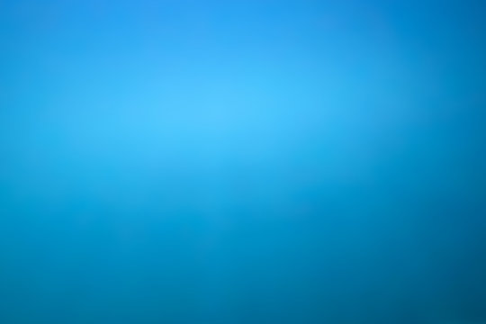 Blue color underwater ocean abstract blur for background