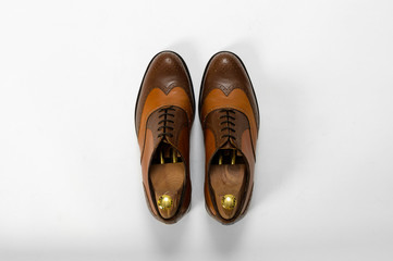 Classic male leather shoes. Isolated on white background. Top view