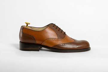 Classic male leather shoes. Isolated on white background. Side view