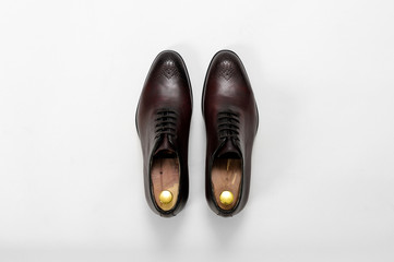 Classic male leather shoes. Isolated on white background. Top view