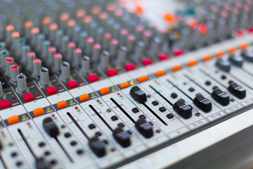 Analog sound mixer with selected focus. Professional audio mixing console radio and television...