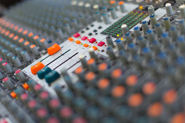 Analog sound mixer with selected focus. Professional audio mixing console radio and television...
