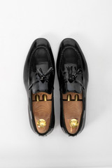 Classic male leather shoes. Isolated on white background. Top view