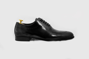 Classic male leather shoes. Isolated on white background. Side view