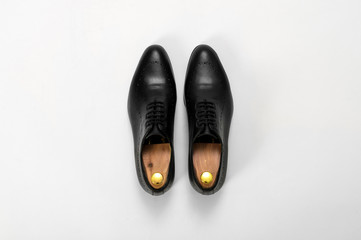 Classic male leather shoes. Isolated on white background. Top view