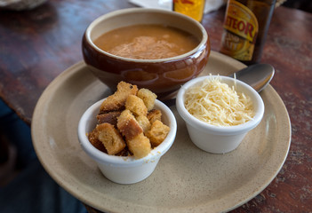 Fish soup with croutons and cheese in Cancale. Brittany, France