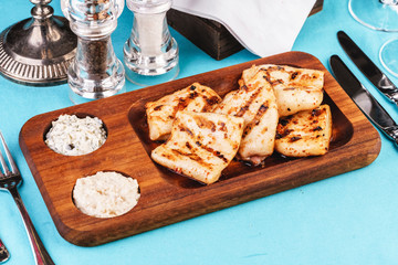 European cuisine, Mediterranean dish. grilled fish pieces with white and brown rice