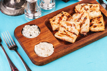 European cuisine, Mediterranean dish. grilled fish pieces with white and brown rice