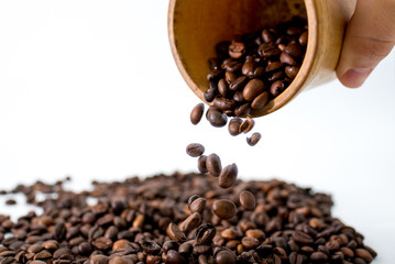 coffee beans in a white cup