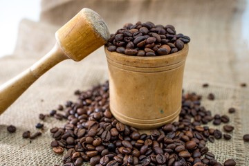 coffee beans in a wooden barrel