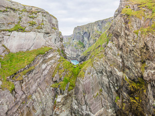 Rough cliff line at Mizen head lighthouse  in southern west Ireland