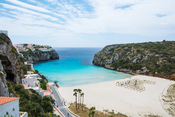 The beautiful beach of Cala en Porter photographed from the town.