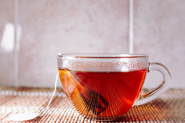 tea in a clear glass black