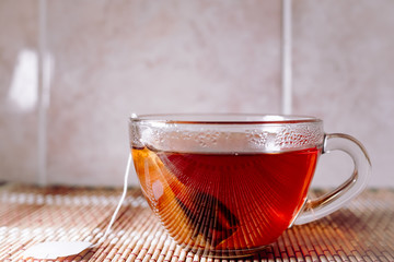 tea in a clear glass black