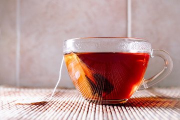 tea in a clear glass black