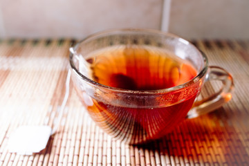 tea in a clear glass black