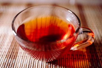 tea in a clear glass black