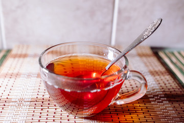 tea in a clear glass black