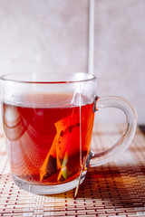 tea in a clear glass black