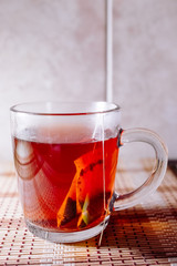 tea in a clear glass black