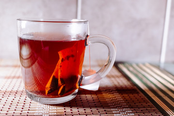 tea in a clear glass black