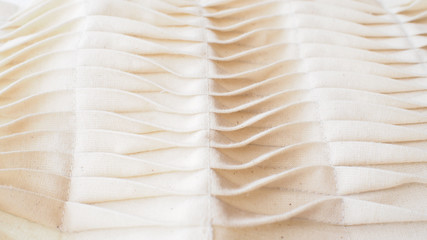 Pleated calico fabric manipulationn textile background