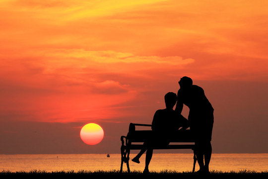 silhouette lover couple on sunrise
